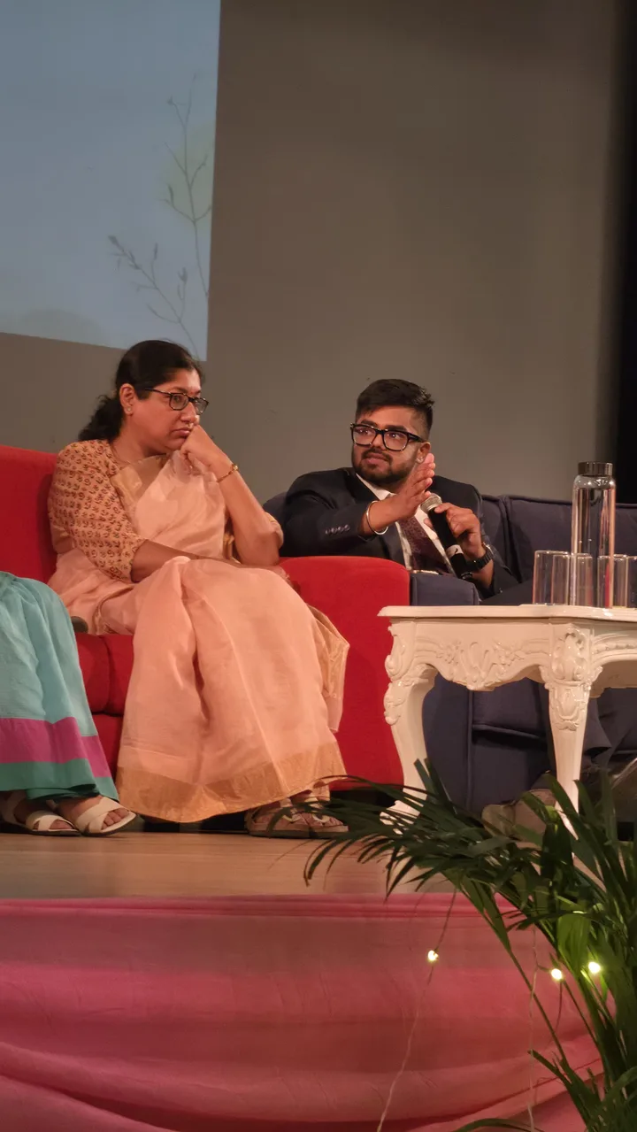 Dr Shaurya Garg speaking into a microphone during the AAYAM panel discussion