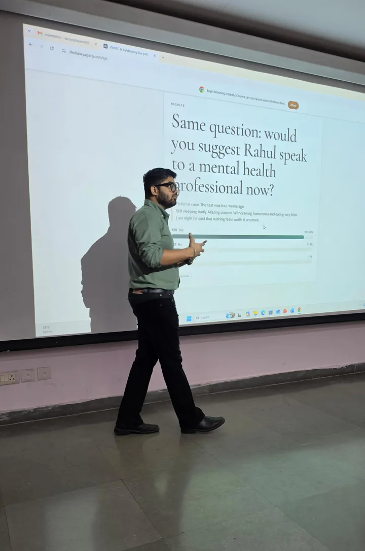 Dr Shaurya Garg discussing a fictional student case with live audience poll results